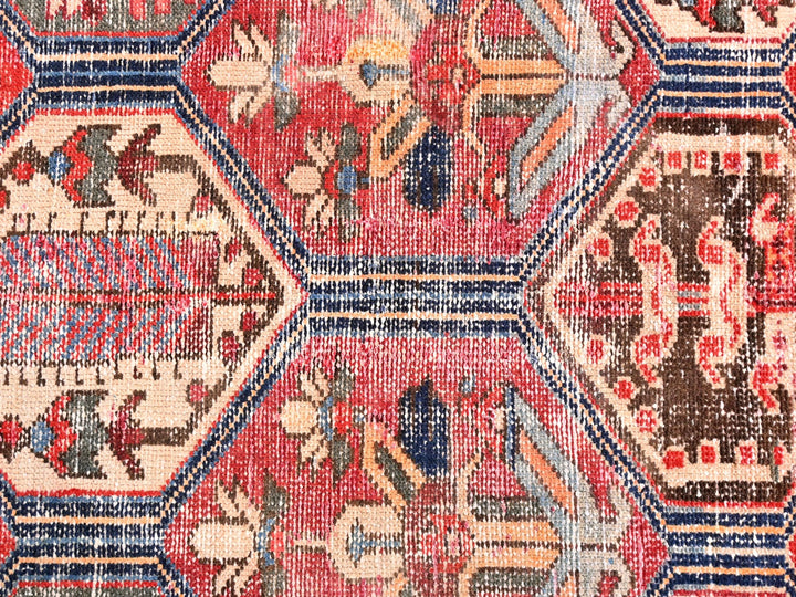 a close up of a rug with a pattern on it