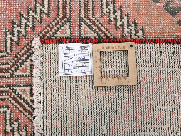 a piece of wood sitting on top of a rug