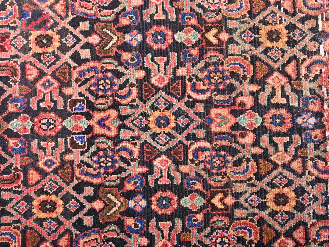 an old rug with a lot of different colors