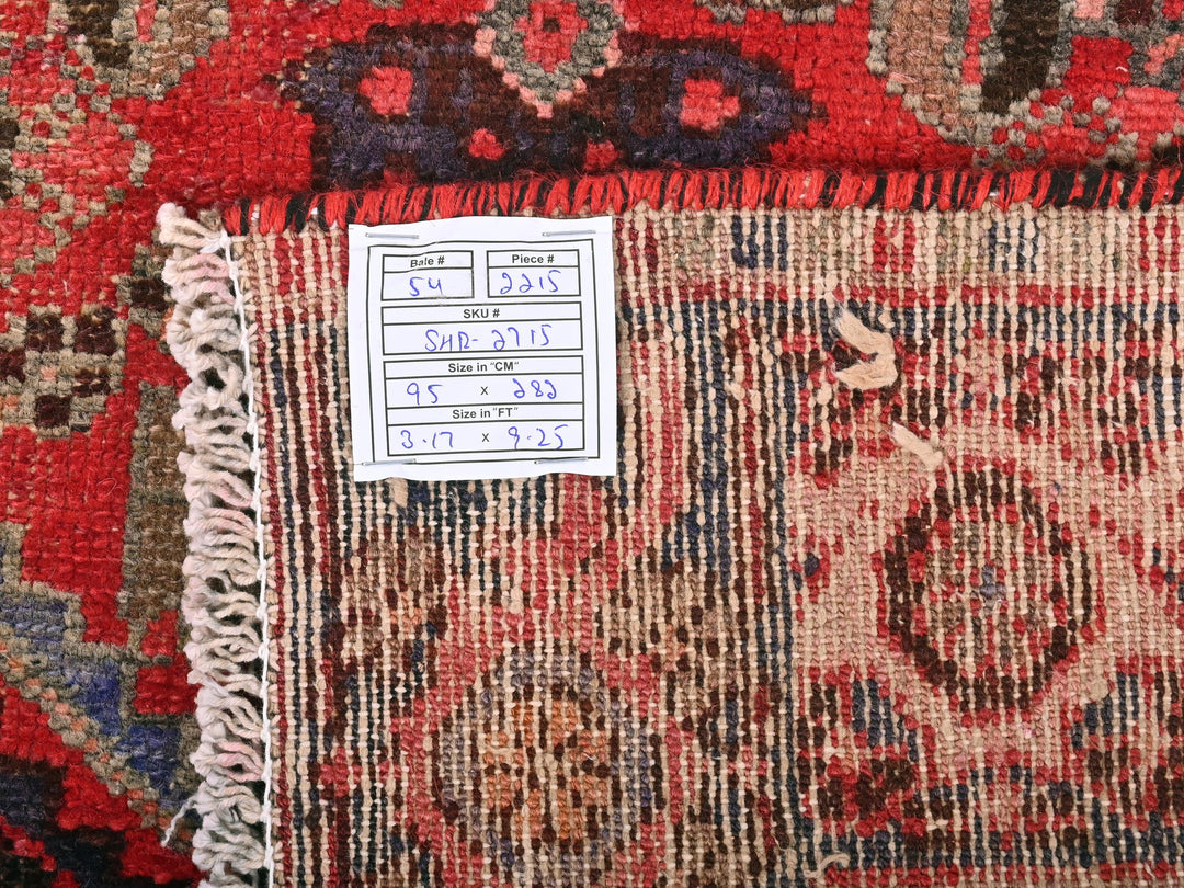 a pile of rugs with a price tag on them