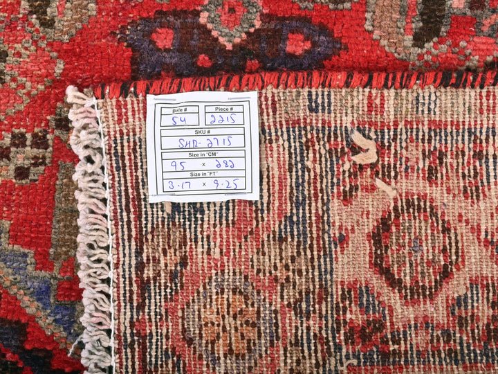 a pile of rugs with a price tag on them
