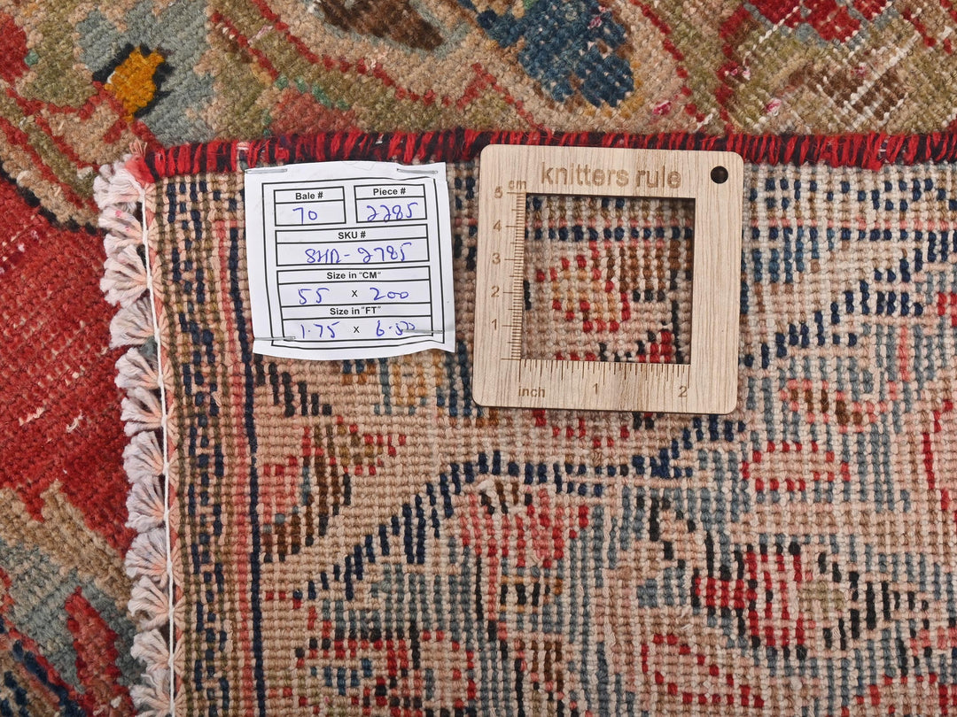 a piece of wood sitting on top of a rug
