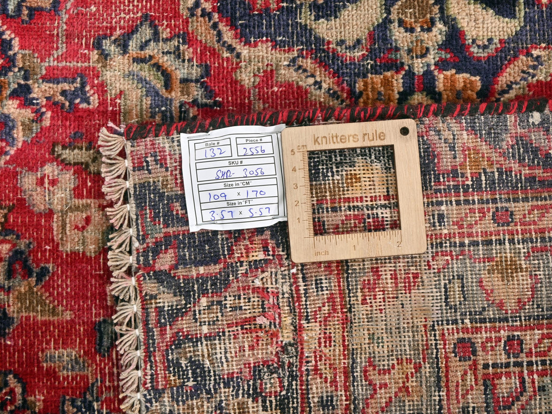 a piece of wood sitting on top of a rug