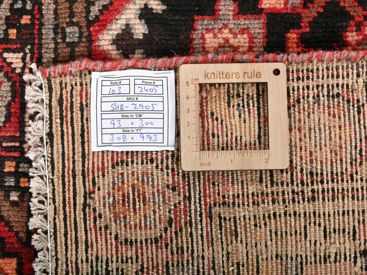 a ruler on a rug with a picture frame on it