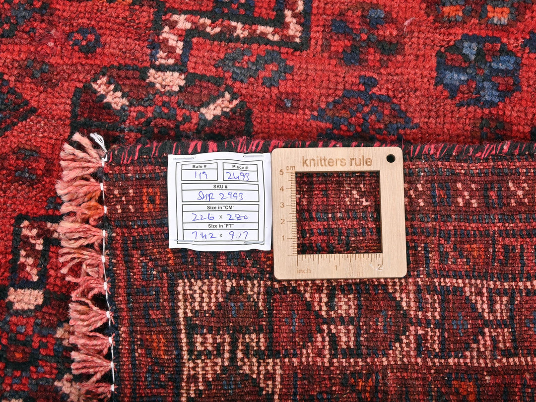 a piece of wood sitting on top of a rug