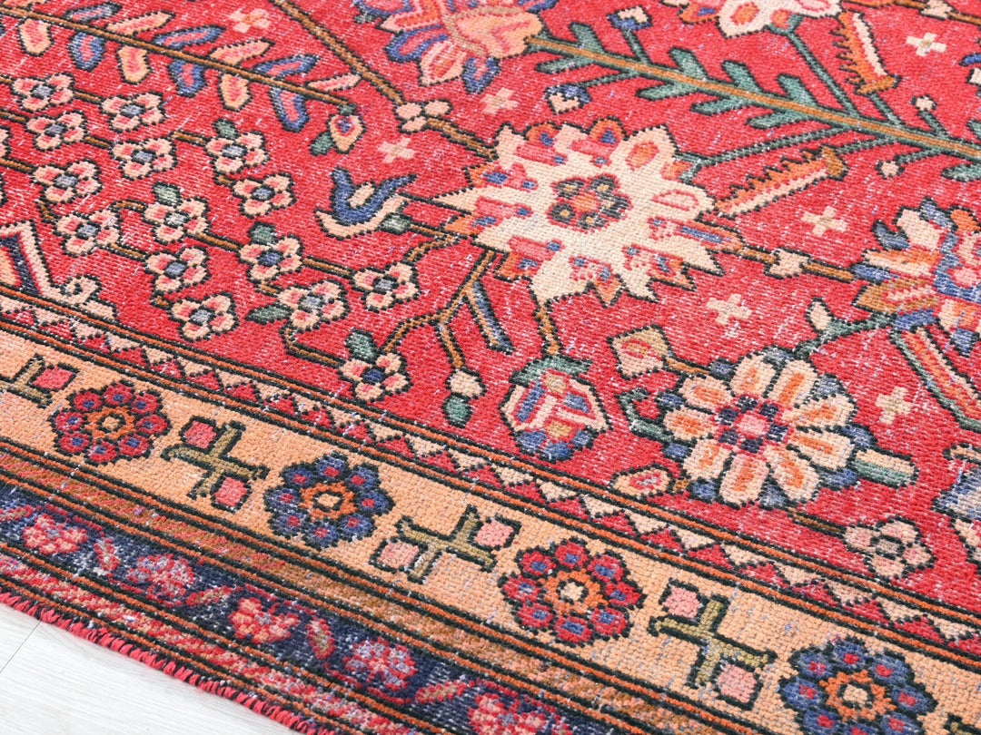a close up of an oriental rug on the floor