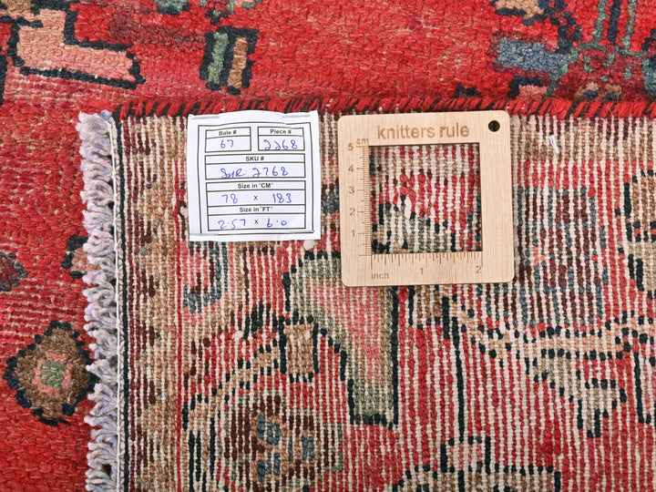 a piece of wood sitting on top of a rug