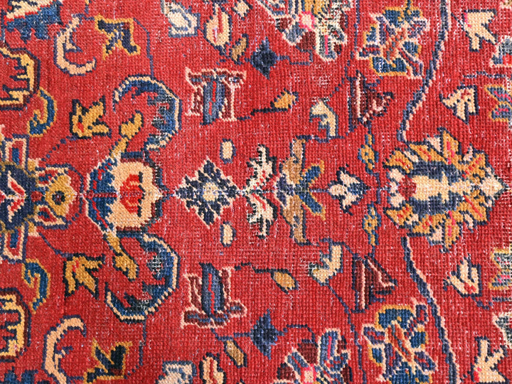 a close up of an oriental rug with many colors