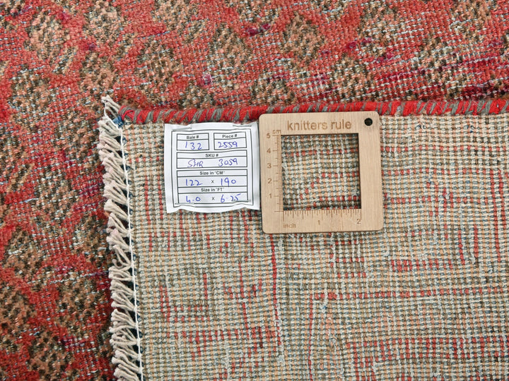a piece of wood sitting on top of a rug