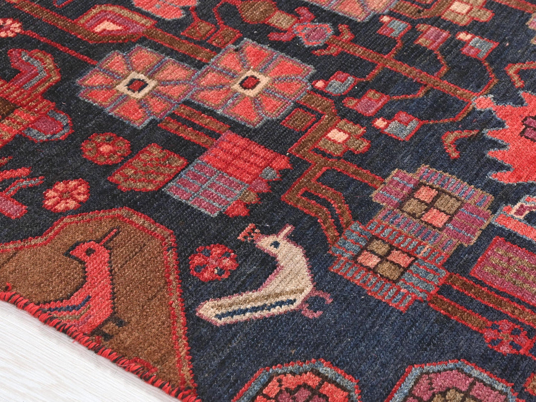 a close up of a rug on a wooden floor