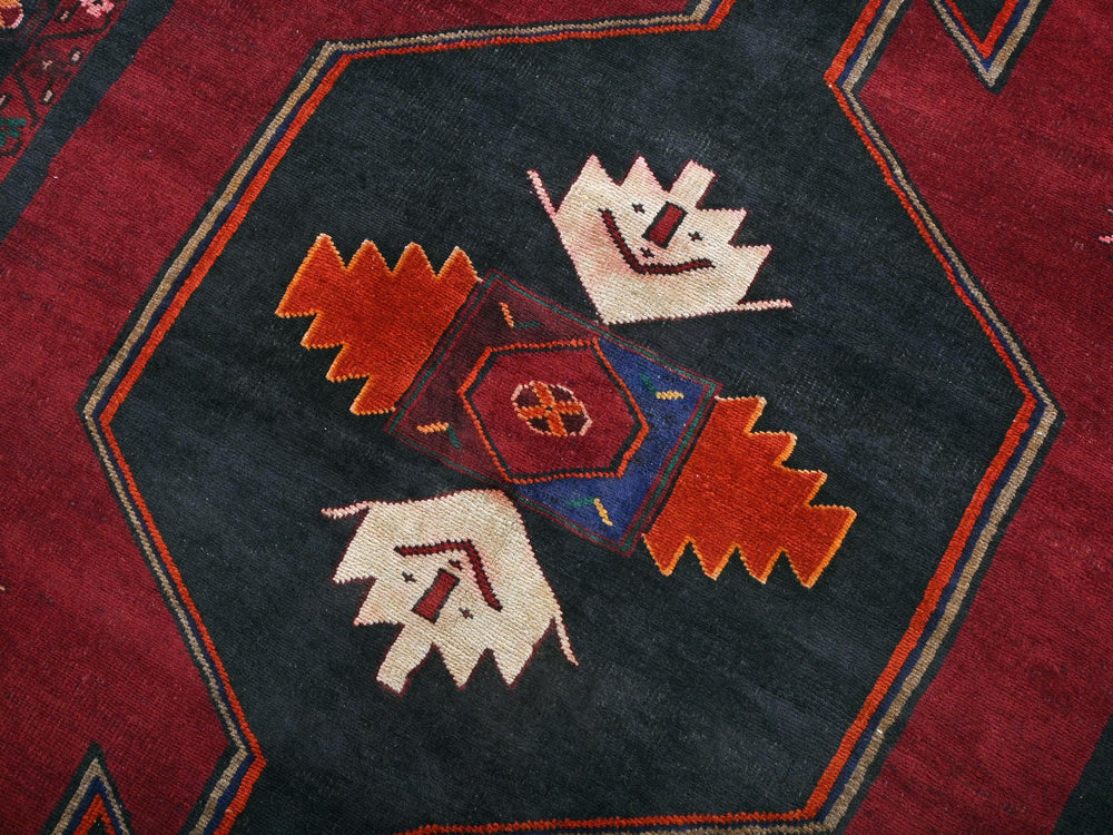a close up of a rug with a design on it