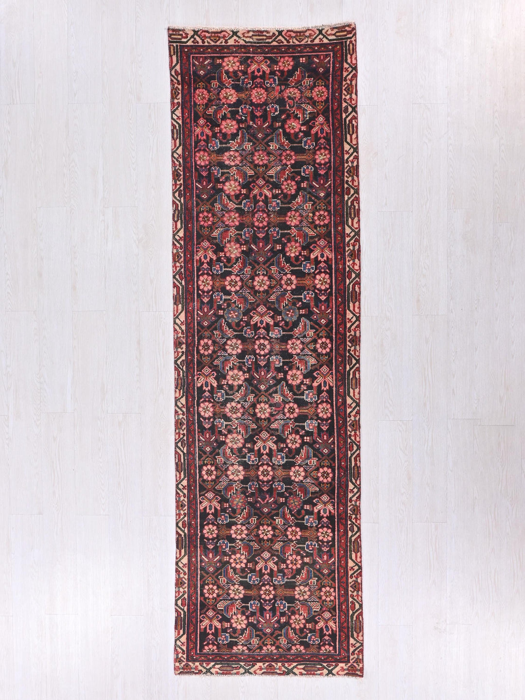 a rug hanging on a wall in a room