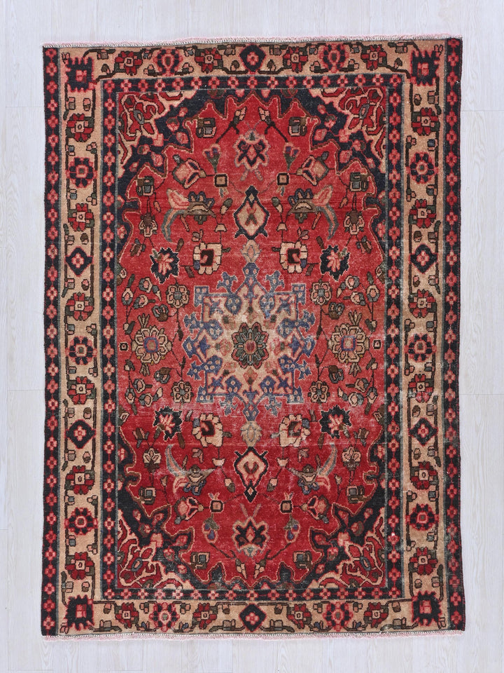 a red rug with a black border on a white background