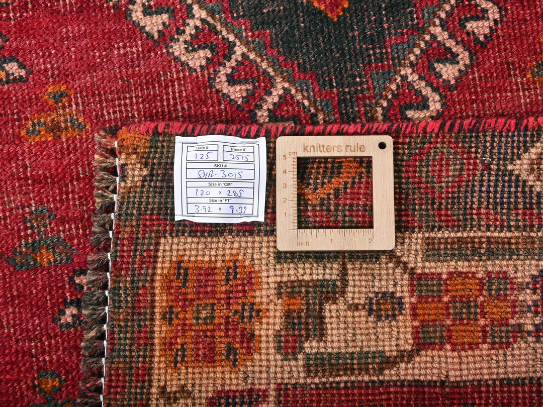a close up of a rug with a phone on it