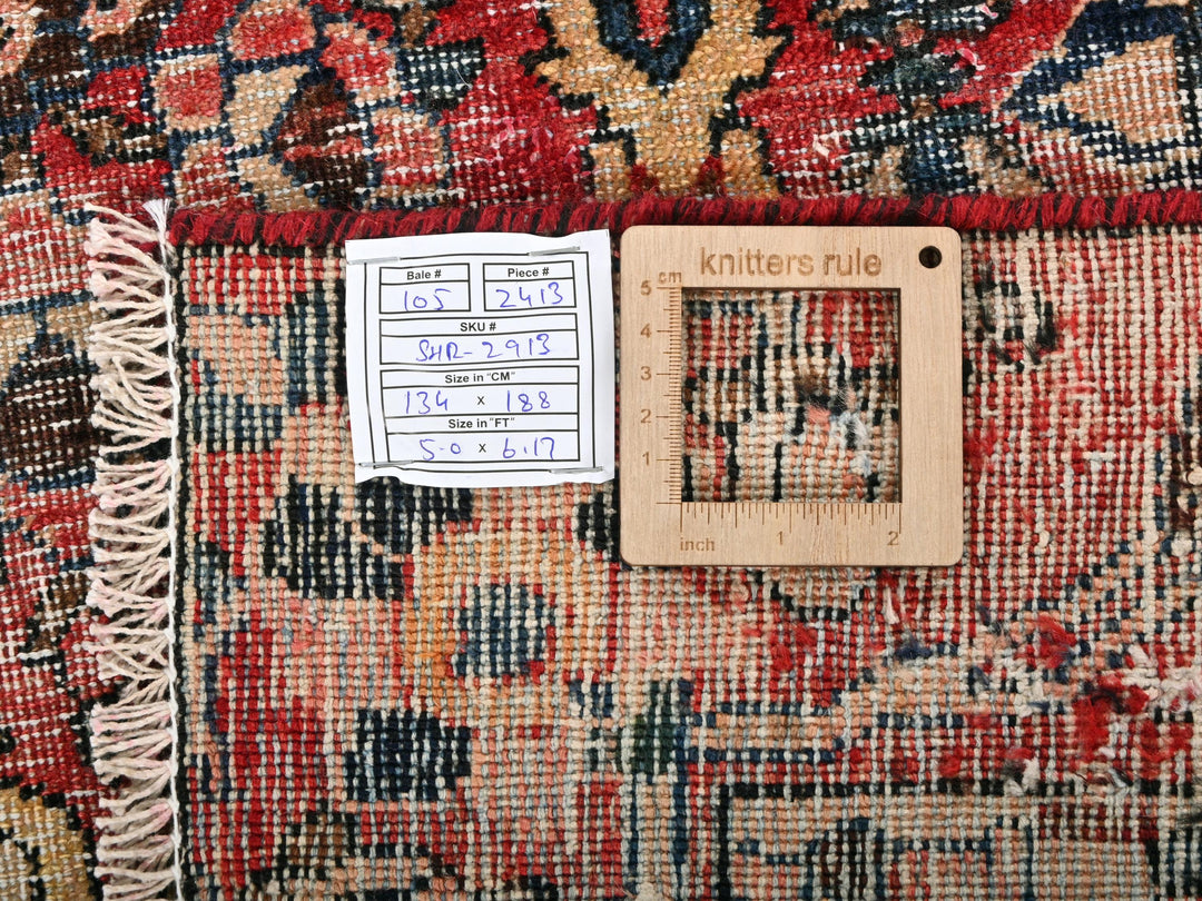 a piece of wood sitting on top of a rug