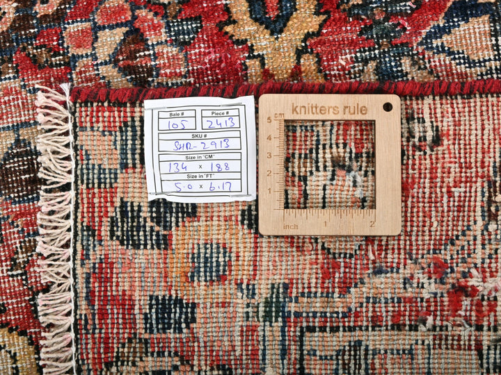 a piece of wood sitting on top of a rug