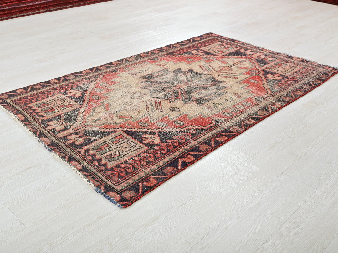 a rug on the floor of a room