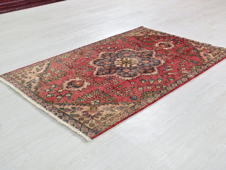 a rug on the floor in a room