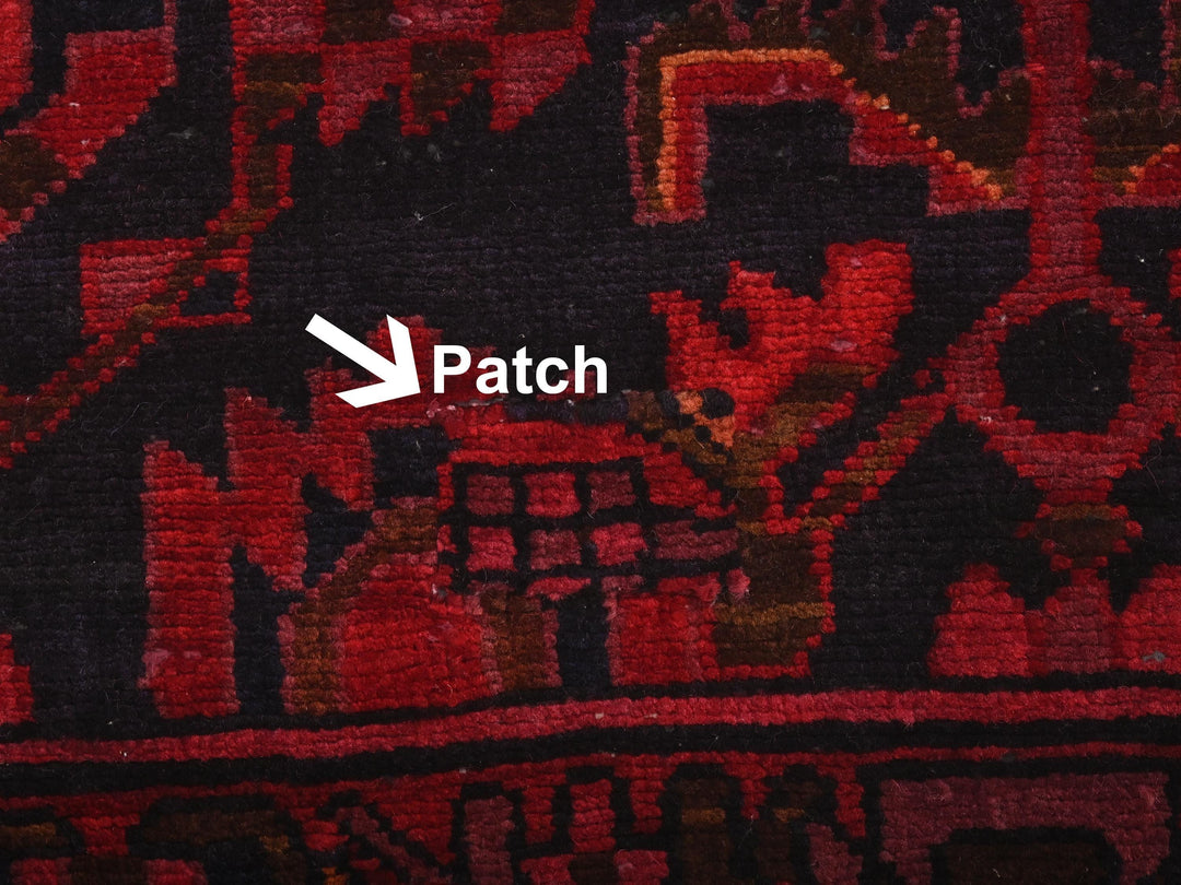 a close up of a rug with the word patch on it