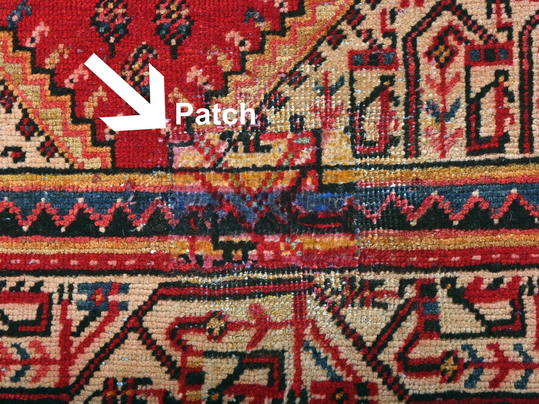 a close up of a rug with an arrow pointing to the right
