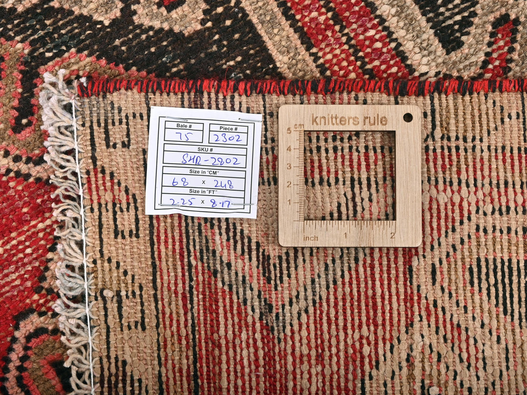 a piece of wood sitting on top of a rug