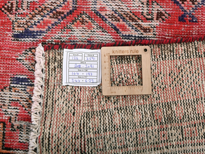 a piece of wood sitting on top of a rug