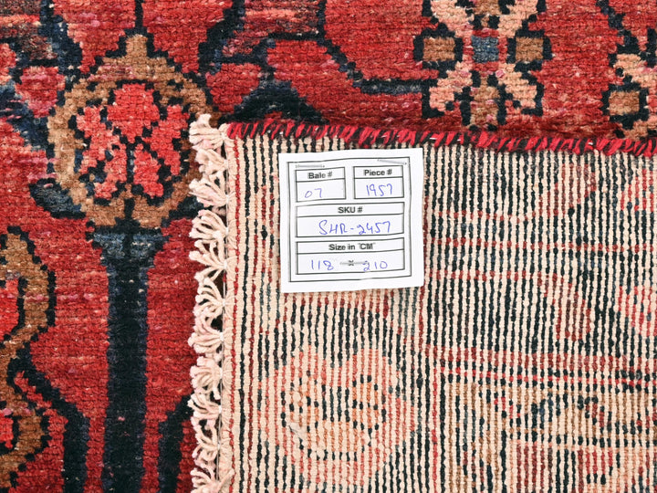 a close up of a rug with a tag on it
