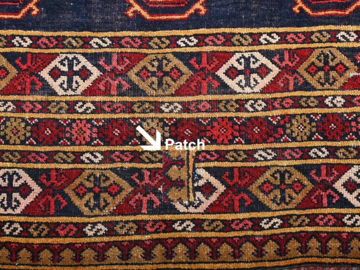 a close up of a rug with different colors