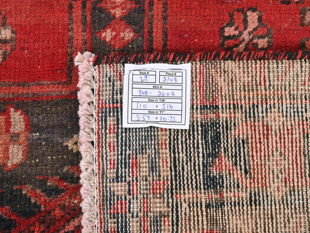 a pile of rugs with a price tag on them