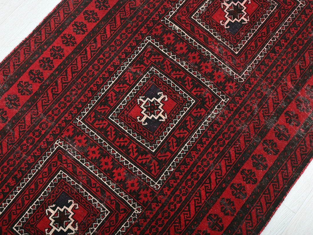 a close up of a rug on a wooden floor