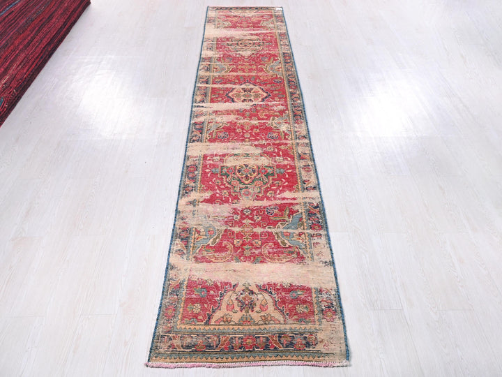 a long rug on the floor in a room