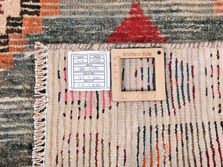 a close up of a rug with a tag on it