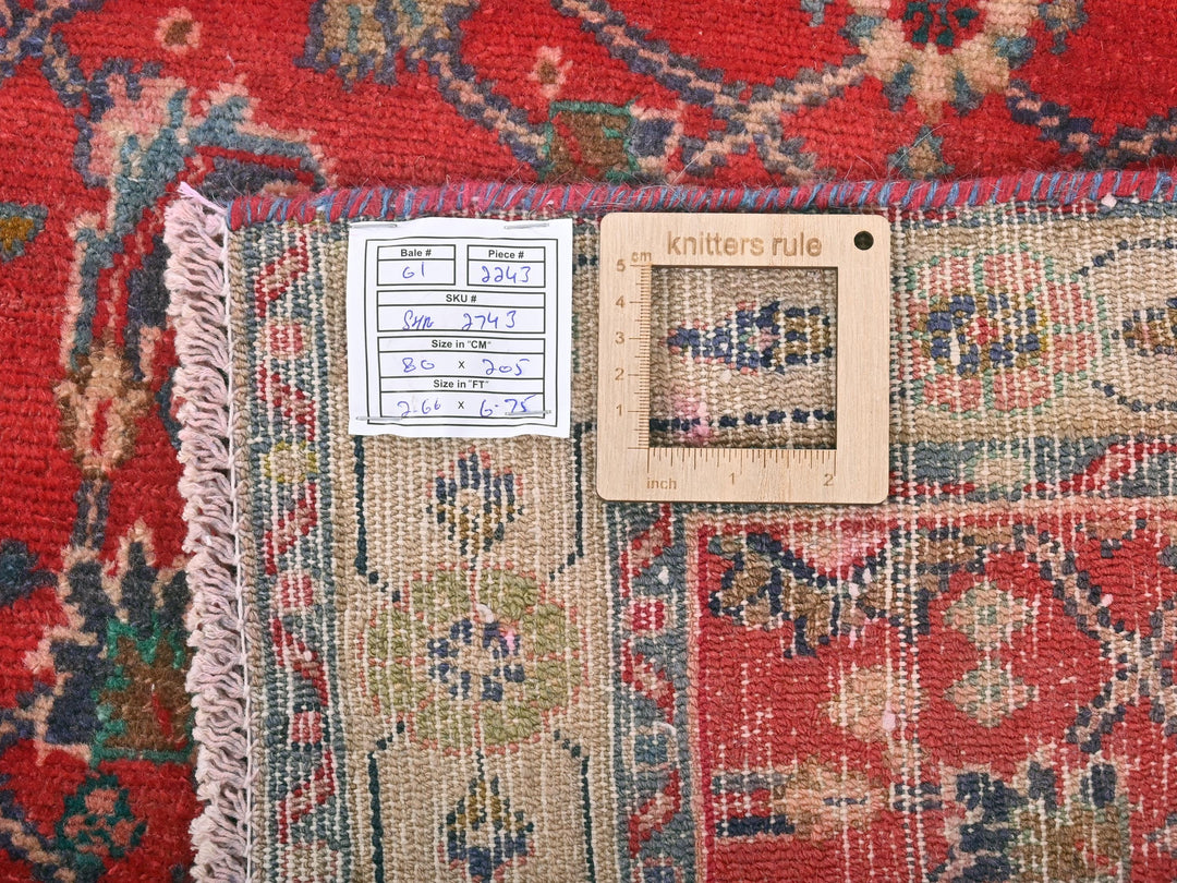 a piece of cloth with a ruler on top of it