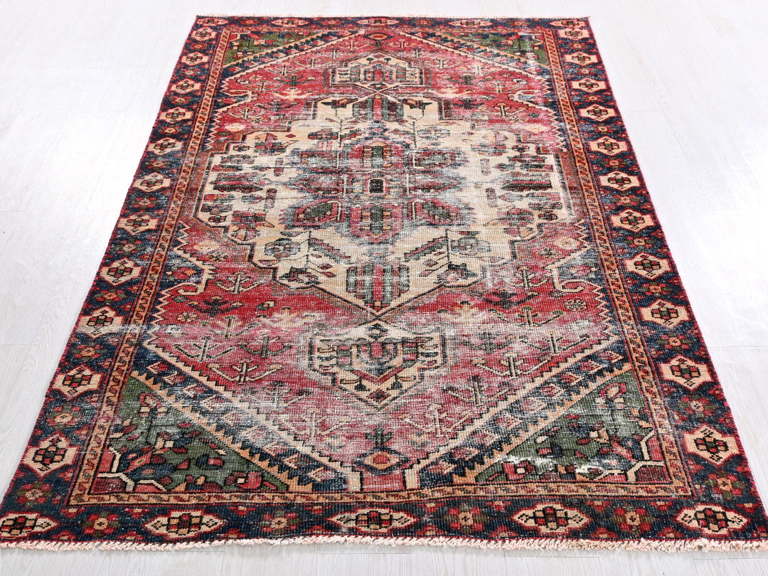 a large oriental rug on a white floor