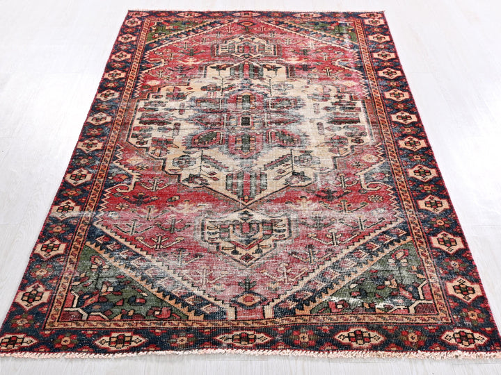 a large oriental rug on a white floor