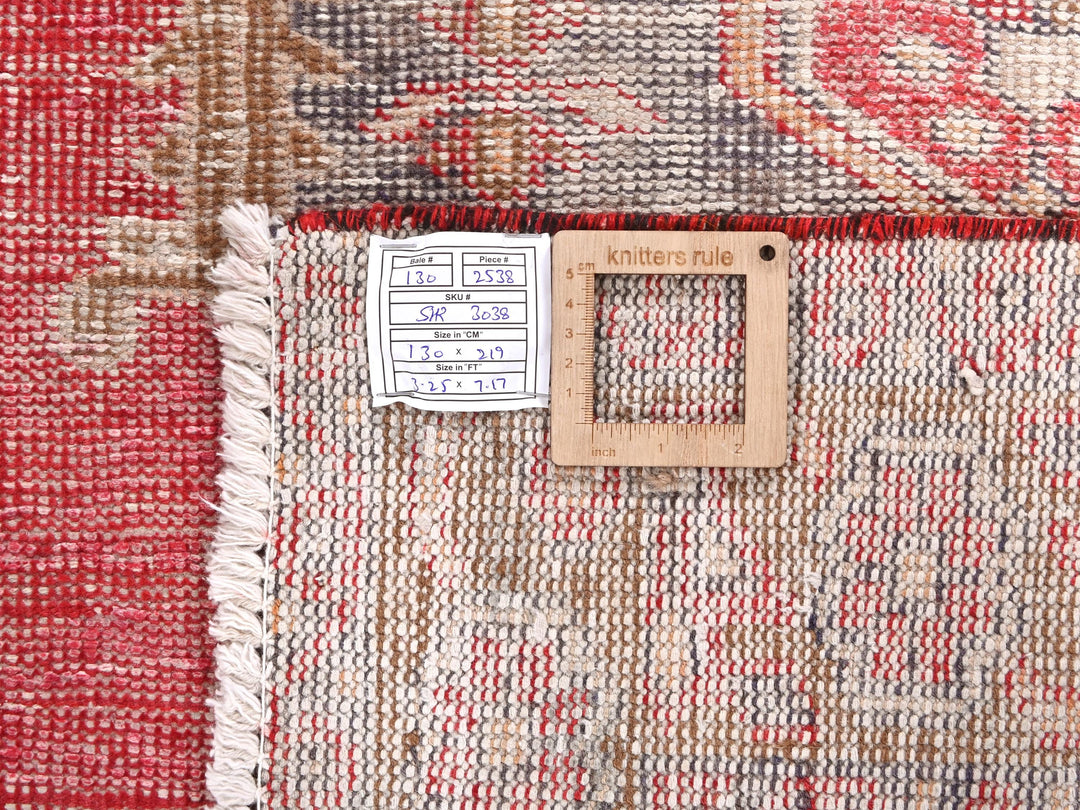 a close up of a rug with a tag on it