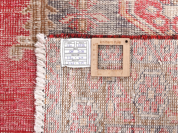 a close up of a rug with a tag on it