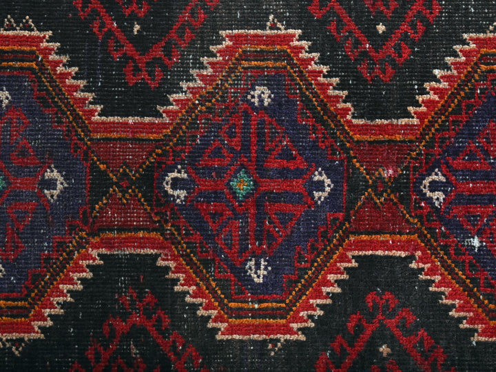 a close up of a rug with a design on it