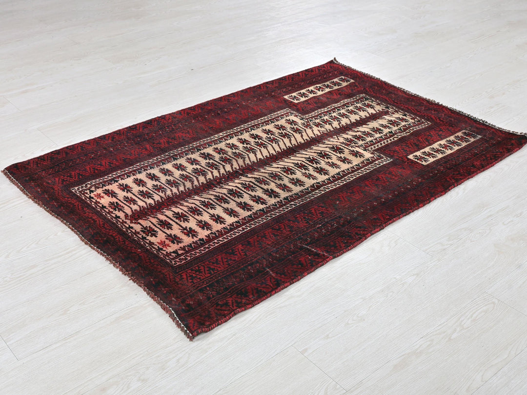 a red rug on the floor of a room