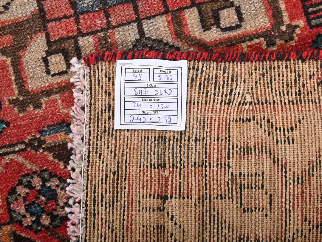 a close up of a rug with a tag on it