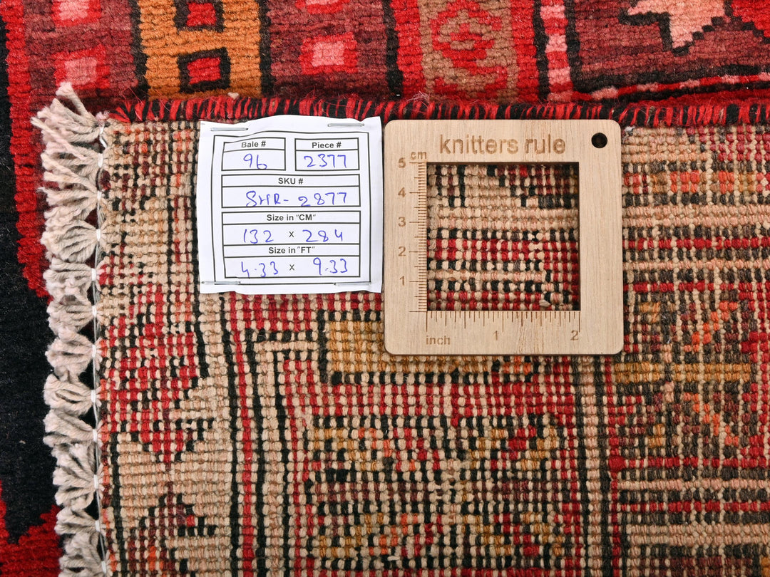 a piece of wood sitting on top of a rug