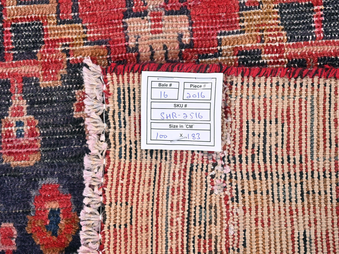 a close up of a rug with a tag on it