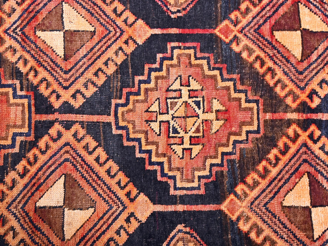 a close up of a rug with a design on it