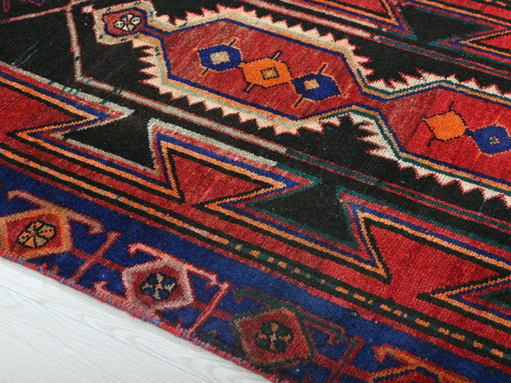 a close up of a colorful rug on the floor