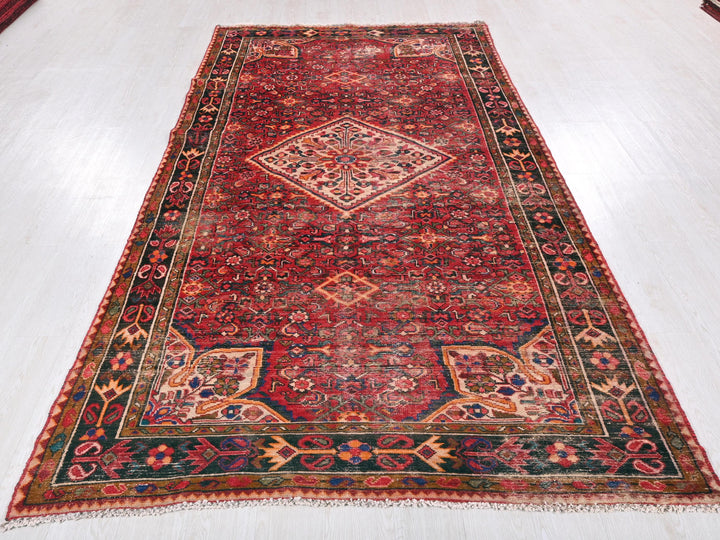 a large oriental rug on a white floor