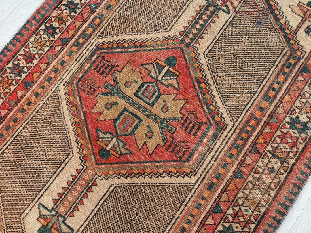 a rug with a design on it on a wooden floor
