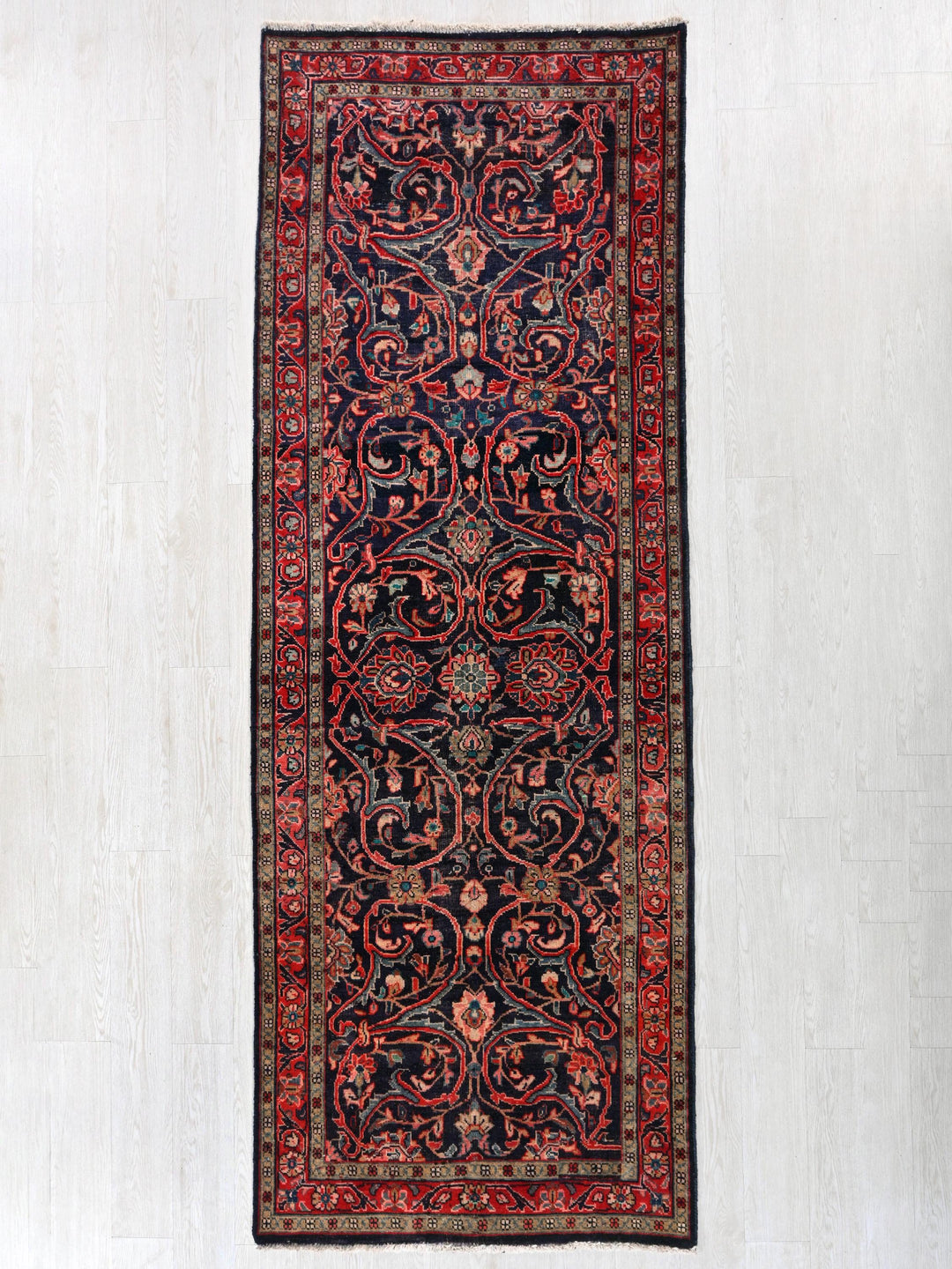 a rug hanging on a wall in a room