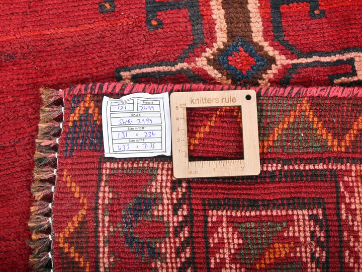 a close up of a rug with a tag on it