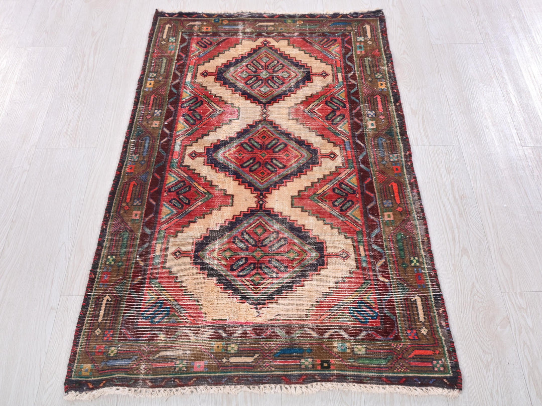 a multicolored oriental rug on a white floor