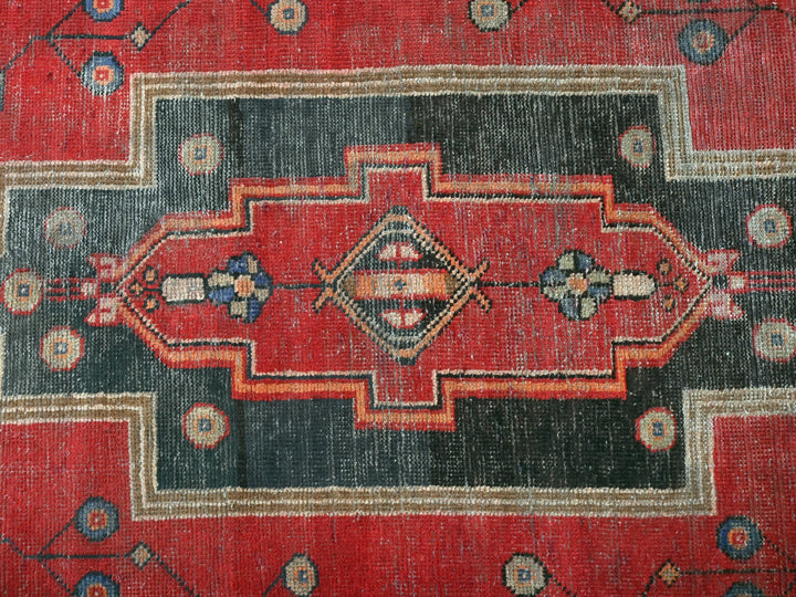 a close up of a rug with a design on it